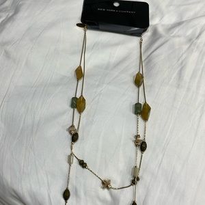 Long beaded chain gold tone